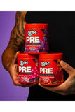 Three containers of BSc Pre supplement held by a person against a black background with a purple gradient